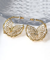 Pendientes de aro con diseño de mariposa hueca y sobredorado en plata de ley y oro de moda
